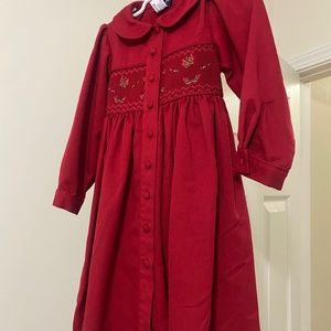 C.F.K. Long sleeve, button down dress with collar and ties in the back